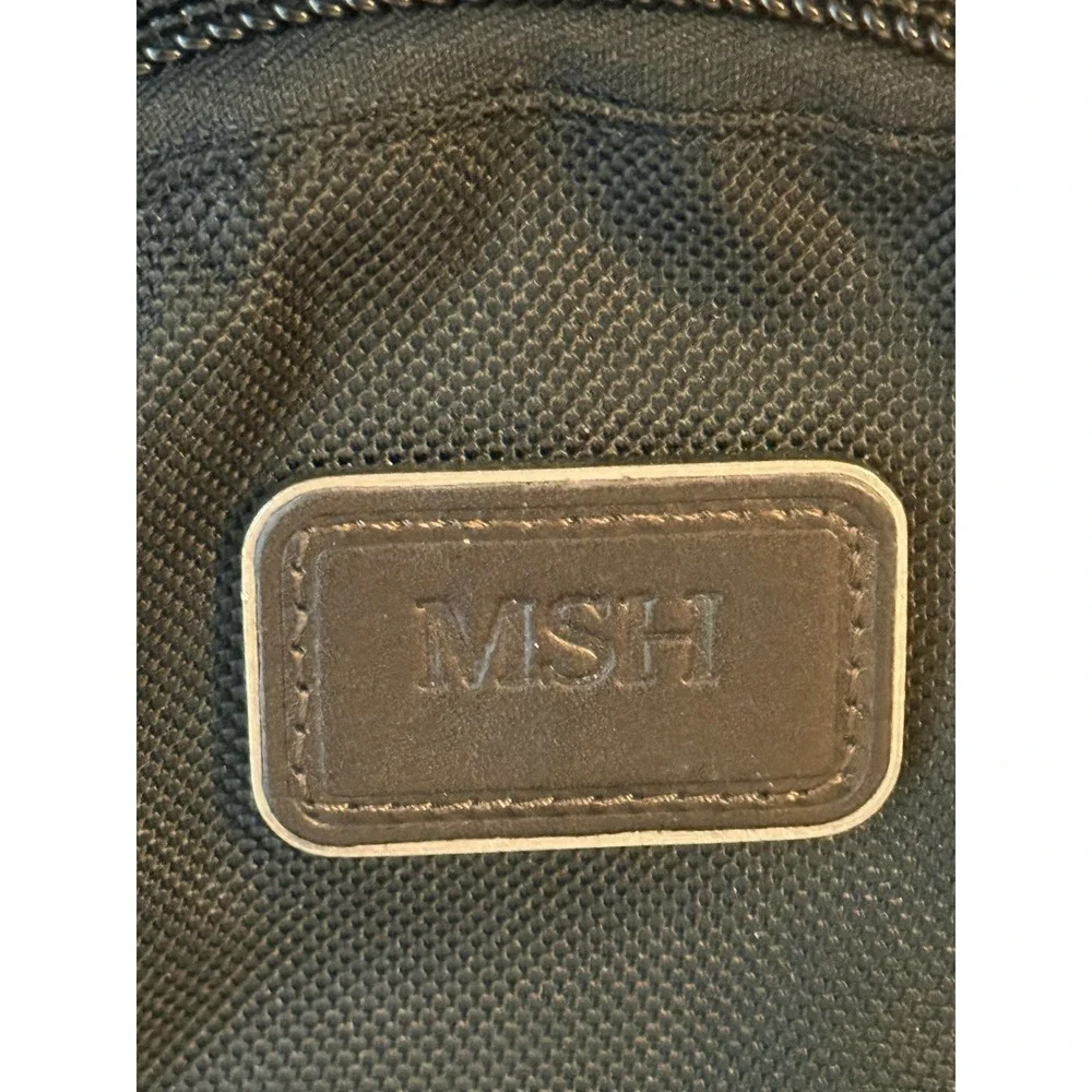 Tumi Black Nylon Backpack with Brown Leather Base and Trim